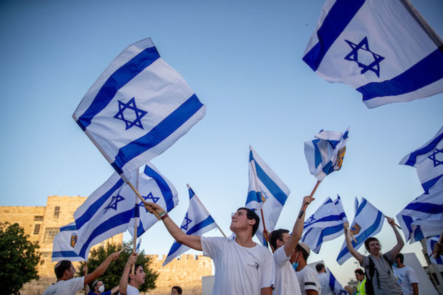 Young Jewish men celebrate Jerusalem Day around the Old City walls of Jerusalem, May 21, 2020. (Photo: Yonatan Sindel/Flash90)