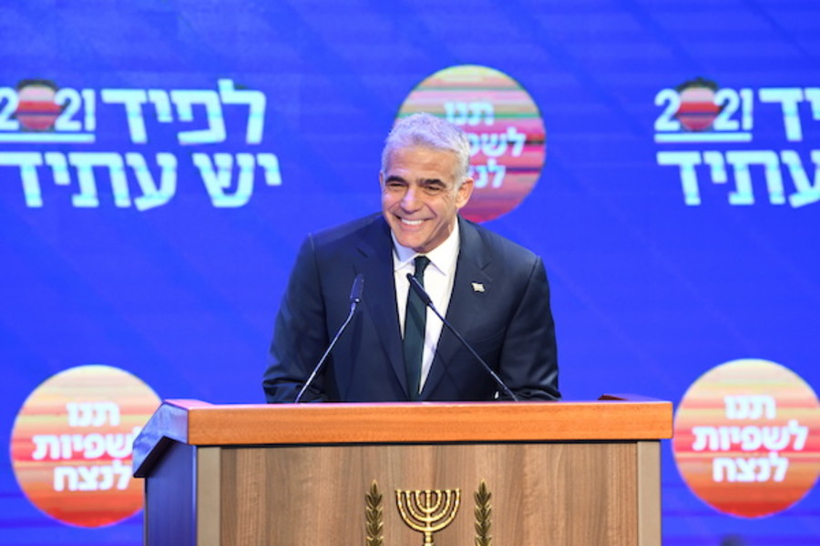 Yair Lapid, head of Yesh Atid Party delivers a speech after the release of first voting results in the Israeli general elections, at the party headquarters in Tel Aviv, on March 24, 2021. (Photo: Gili Yaari /Flash90)