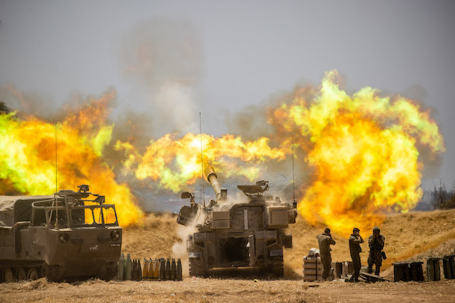IDF Artillery Corps seen firing into Gaza, near the Israeli border with Gaza on May 12, 2021, following heavy rocket and missile barrage fired into Israel by militants in Gaza. (Photo: Yonatan Sindel/Flash90)