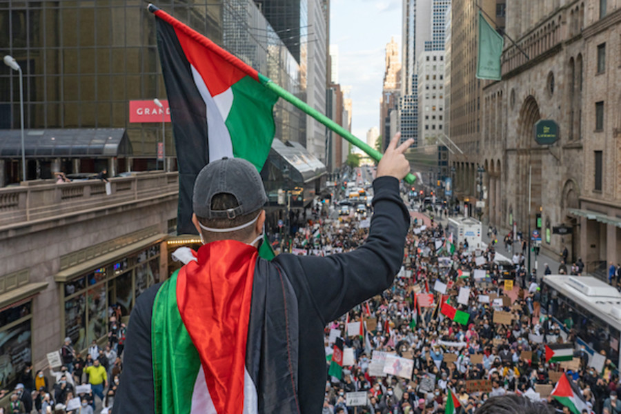 NEW YORK, NY - MAY 11: A larger group of pro-Palestinian supporters marched through New York City, carrying banners condemning Israeli actions on May 11, 2021 in New York City. (Source: Shutterstock)