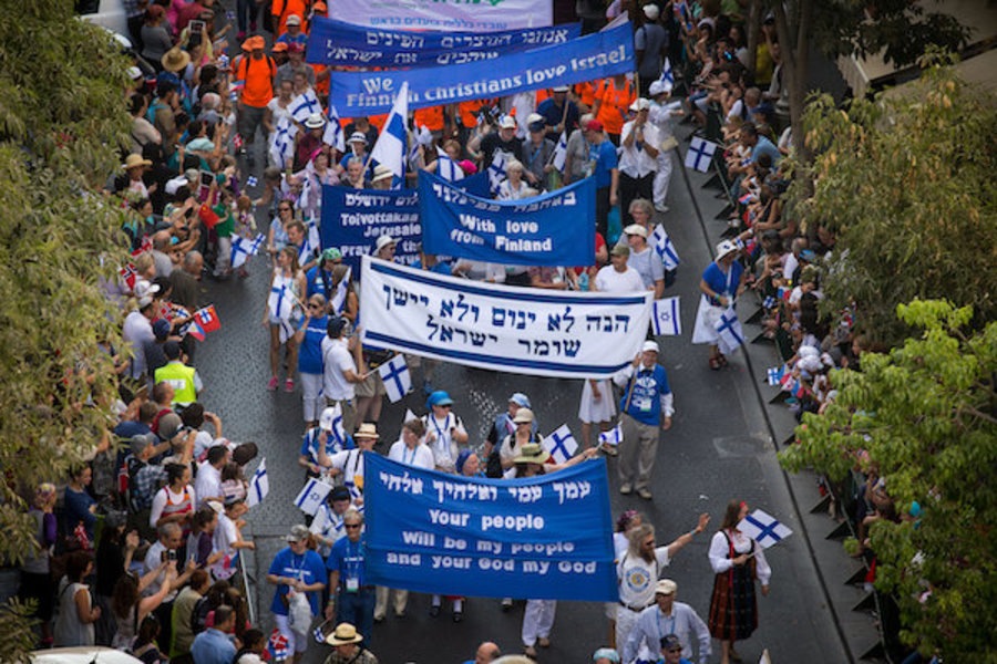 Thousands of Evangelical Christians wave their national flag alongside the Israeli one as they parade in the center of Jerusalem, marking the Feast of the Tabernacles, Oct. 1, 2015. (Photo: Nati Shohat/Flash90)