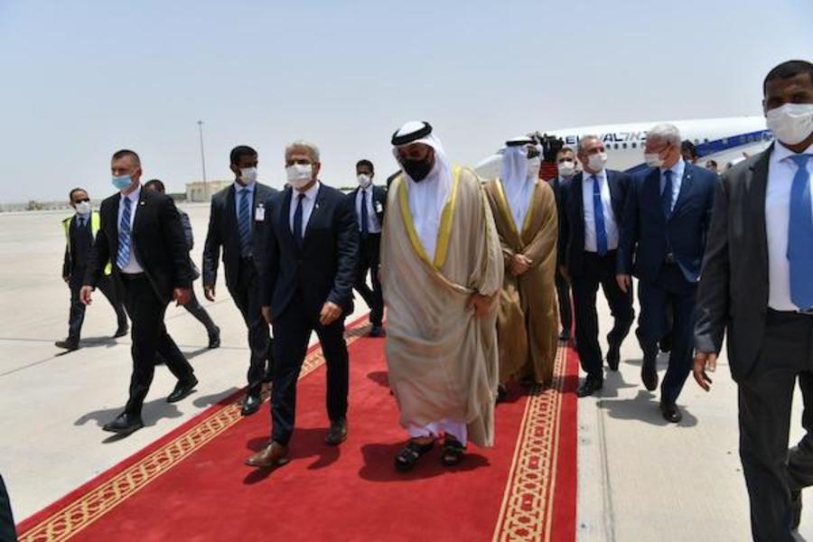FM Yair Lapid greeted by UAE Minister of State Ahmed Al Sayegh upon his arrival in Abu Dhabi, June 29, 2021 (Photo: Israel Ministry of Foreign Affairs/Twitter)
