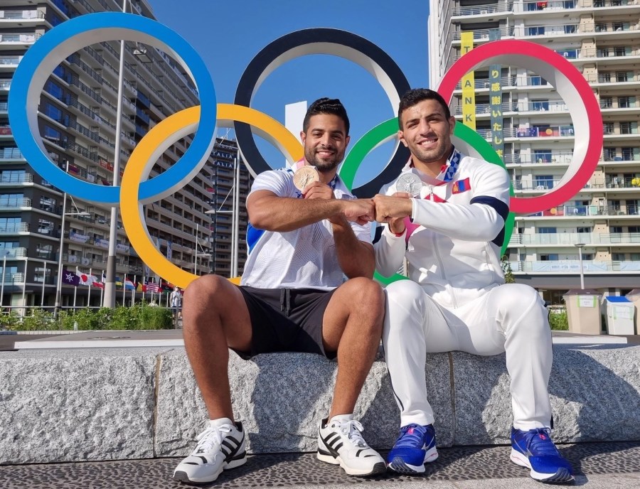 Israel's Sagi Muki and Iranian defector, Saied Mollaei - now of Mongolia - display their Olympic medals in Tokyo, July 2021. (Photo: Facebook)