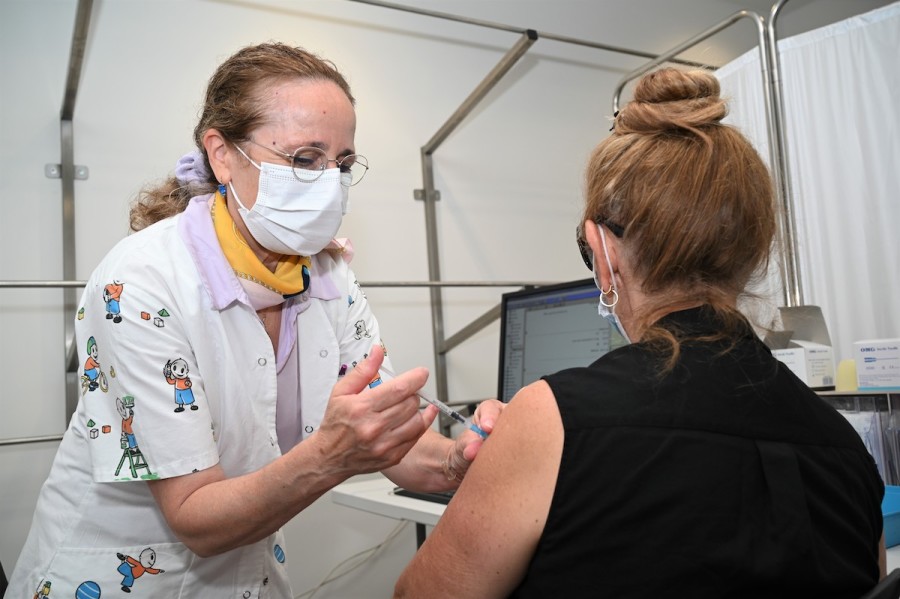 An Israeli receives a third dose of Pfizer's COVID vaccine, Aug. 16, 2021. (Photo: Michael Giladi/Flash90)