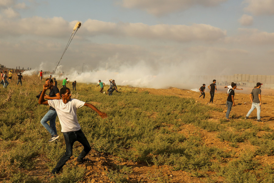 Palestinian protesters clash with Israeli forces during a protest at the Israel-Gaza border, east of Gaza City, Aug. 21, 2021. (Photo: Abed Rahim Khatib/Flash90)