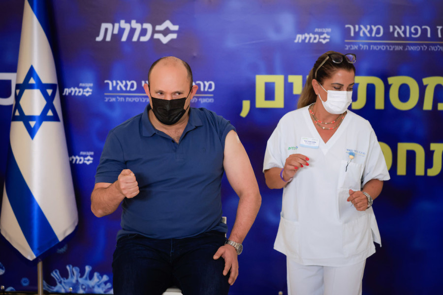 Israeli Prime Minister Naftali Bennett receives his third dose of the COVID-19, Aug. 20, 2021. (Photo: Olivier Fitoussi/Flash90)