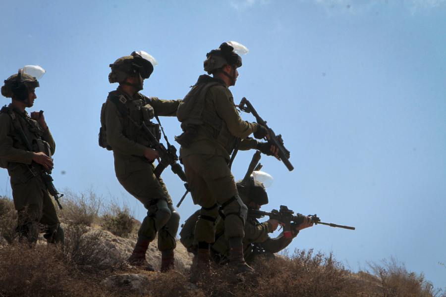 Illustrative - Palestinians clash with Israeli security forces during a protest in the village of Beit Dajan, near the West Bank city of Nablus, Sept. 17, 2021. (Photo: Nasser Ishtayeh/Flash90)