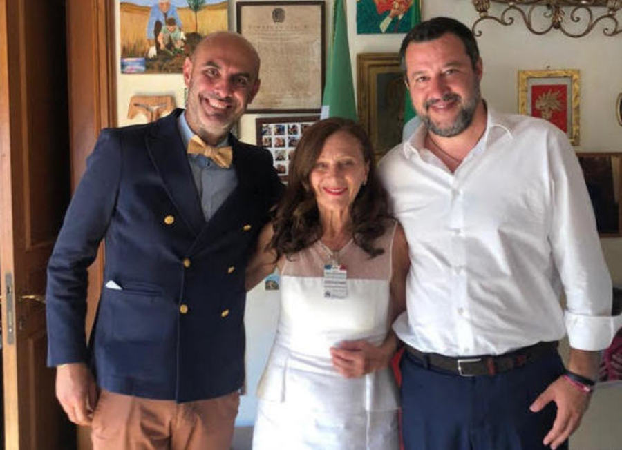 Italian Senators Simone Pillon (L) and Matteo Salvini with the event organizer in Rome Edda Fogarollo (C)