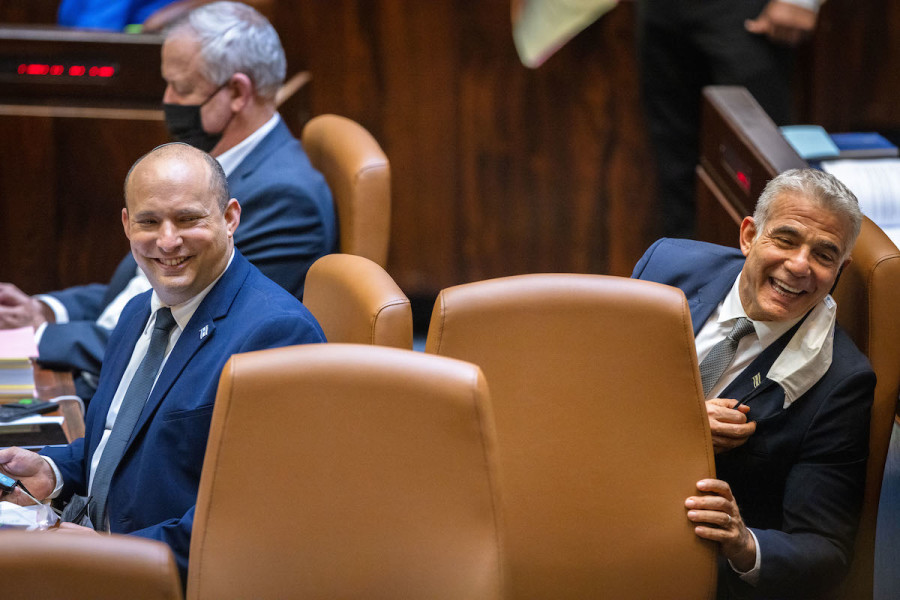 Israeli Prime Minister Naftali Bennett and Foreign Minister Yair Lapid during the vote on the state budget at the Knesset hall in Jerusalem, Nov. 3, 2021. (Photo: Olivier Fitoussi/Flash90)
