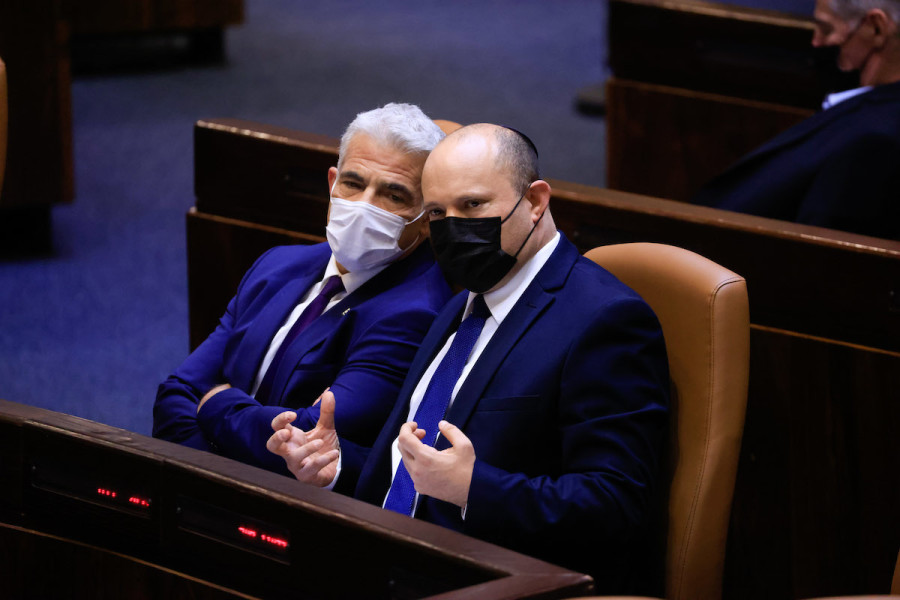 Israeli Prime Minister Naftali Bennett and Foreign Minister Yair Lapid during a vote on the state budget at the assembly hall in the Israeli parliament, Sep. 2, 2021. (Photo: Olivier Fitoussi/Flash90)