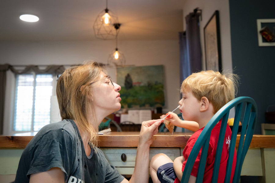 A mother tests her son with a COVID-19 rapid antigen home kit test ahead of returning back to kindergarten following the Sukkot holiday, Sep. 27, 2021. (Photo: Chen Leopold/Flash90)
