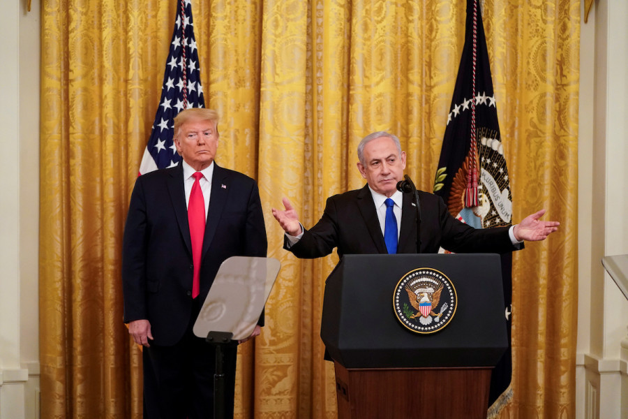 U.S. President Donald Trump and Israel's Prime Minister Benjamin Netanyahu deliver joint remarks on a Middle East peace plan proposal in the East Room of the White House in Washington, U.S., Jan. 28, 2020. (Photo: Joshua Roberts/Reuters)