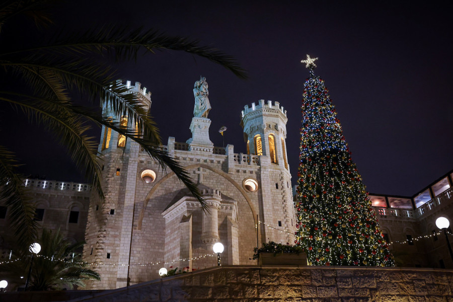 A giant Christmas tree at the Notre Dame hotel outside Jerusalem Old City, December 16, 2021. (Photo: Nati Shohat/Flash90)