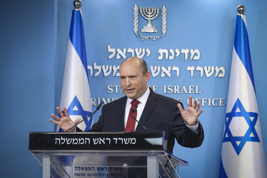 Israeli Prime Minister Naftali Bennett holds a press conference at the Prime Minister's office in Jerusalem on Dec. 19, 2021. (Photo: Marc Israel Sellem/POOL)
