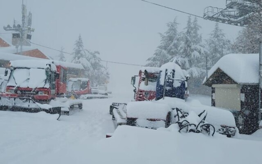 Snow covers bulldozers and emergency vehicles at the Hermon ski resort in the Golan Heights, Jan. 26, 2022. (Photo: Hermon Ski Resort)