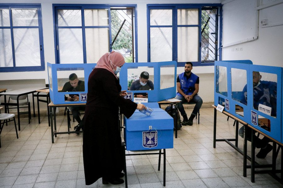 Arab-Israelis cast their ballots as they vote in Israel's general election, in Kafr Manda, northern Israel, March 23, 2021. (Photo: Jamal Awad/FLASH90)