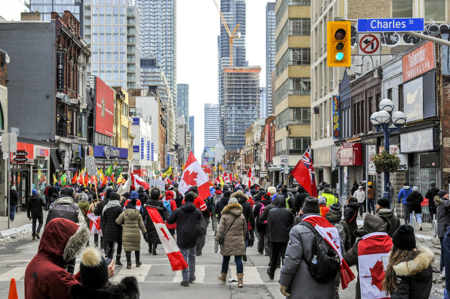 Anti-mandate protesters, also known as "Freedom Convoy," took to the street in downtown Toronto to protest vaccine mandates, Feb. 12, 2022. (Photo: Dominic Chan/Sipa USA via Reuters)