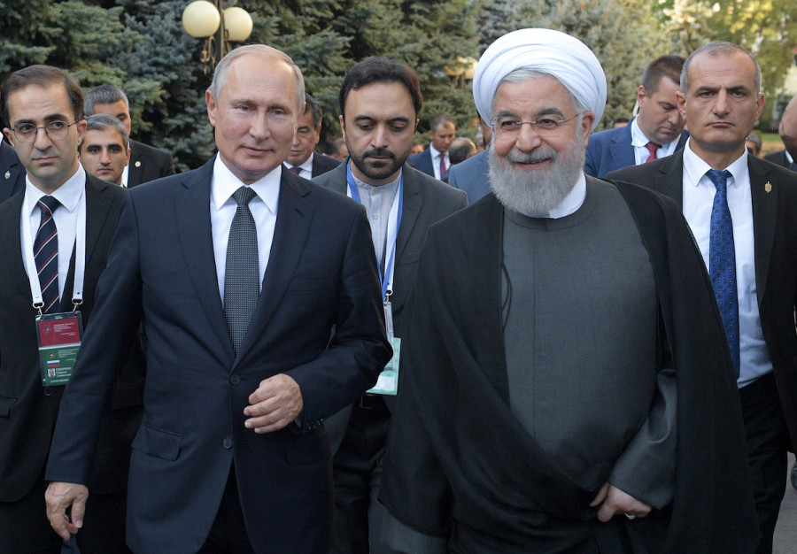 Russian President Vladimir Putin and then-Iranian President Hassan Rouhani arrive for a meeting on the sidelines of a session of the Supreme Eurasian Economic Council in Yerevan, Armenia, Oct. 1, 2019. (Photo: Sputnik/Alexei Druzhinin/Kremlin via Reuters)