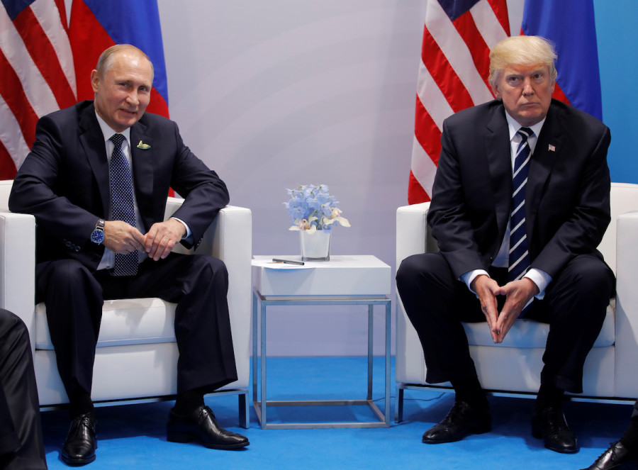 U.S. President Donald Trump meets with Russian President Vladimir Putin during their bilateral meeting at the G20 summit in Hamburg, Germany July 7, 2017. (Photo: Reuters/Carlos Barria)