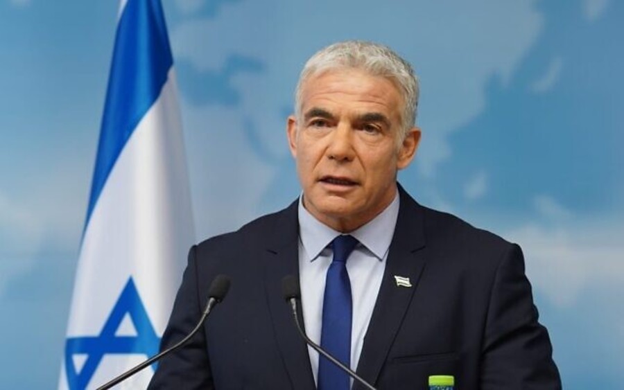 Foreign Minister Yair Lapid delivers remarks to the media, condemning Russia's invasion of Ukraine, Feb. 24, 2022 (Photo: Niv Musman/GPO)