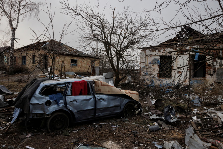 The debris of damaged houses lies on the ground near the spot where a cultural center and administration building once stood, destroyed during an aerial bombing as Russia's advance on the Ukrainian capital continues, in the village of Byshiv outside Kyiv, Ukraine, March 12, 2022. (Photo: REUTERS/Thomas Peter)