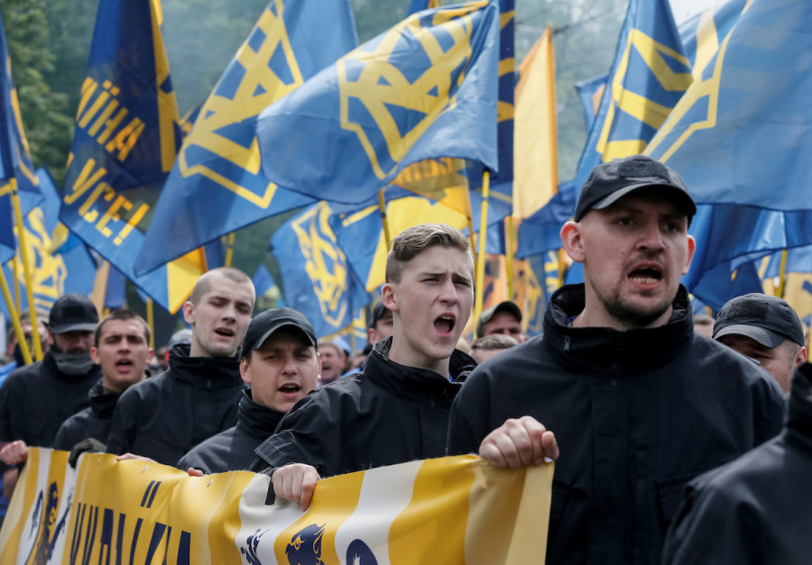 Members of the Ukrainian national guard "Azov" regiment and activists of the Azov civil corp take part in a protest against local elections in pro-Russian rebel-held areas of eastern Ukraine under the Minsk peace agreement, in Kiev, Ukraine, May 20, 2016. (Photo: Reuters/Gleb Garanich)