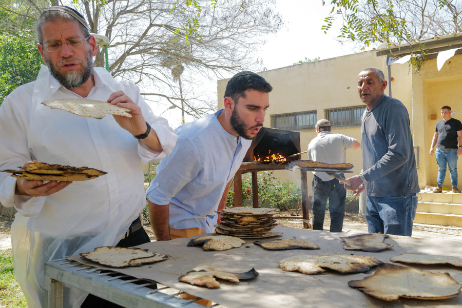 Orthodox Jews bake matzah before the holiday of Passover begins, Moshav Ramat Magshimim, Golan Heights. (Photo: Michael Giladi/Flash90)