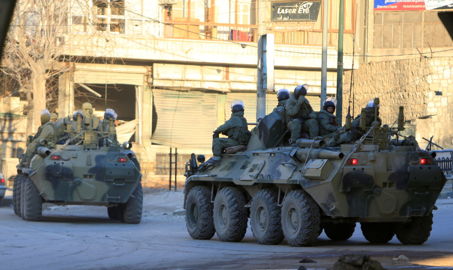 Russian soldiers in armored vehicles patrolling a street in Aleppo, Syria, Feb. 2, 2017. (Photo: Reuters/Ali Hashisho)