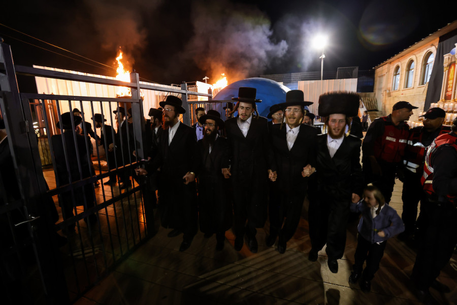Ultra-orthodox Jews dance during Lag B'Omer celebrations on Mt. Meron, May 18, 2022. (Photo: David Cohen/Flash90)