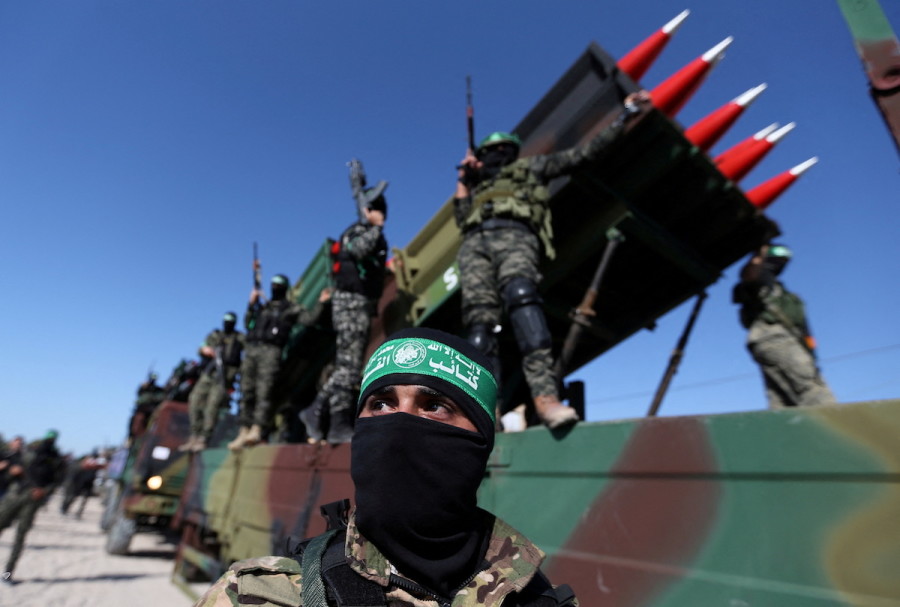 Palestinian Hamas militants attend an anti-Israel rally in Khan Younis, in the southern Gaza Strip, May 27, 2021. (Photo: Reuters/Ibraheem Abu Mustafa)