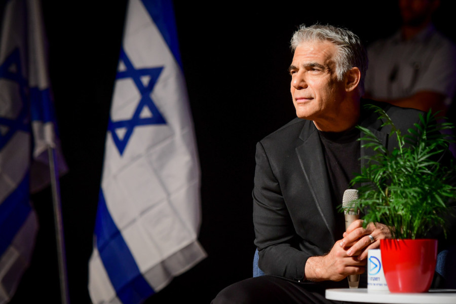 Yair Lapid speaks at a conference in Jaffa, June 7, 2022. (Photo: Avshalom Sassoni/Flash90)