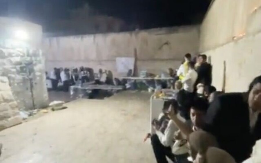 Jewish worshippers at Joseph's Tomb in Nablus as Palestinian gunmen open fire on them, June 30, 2022. (Screenshot: Twitter)