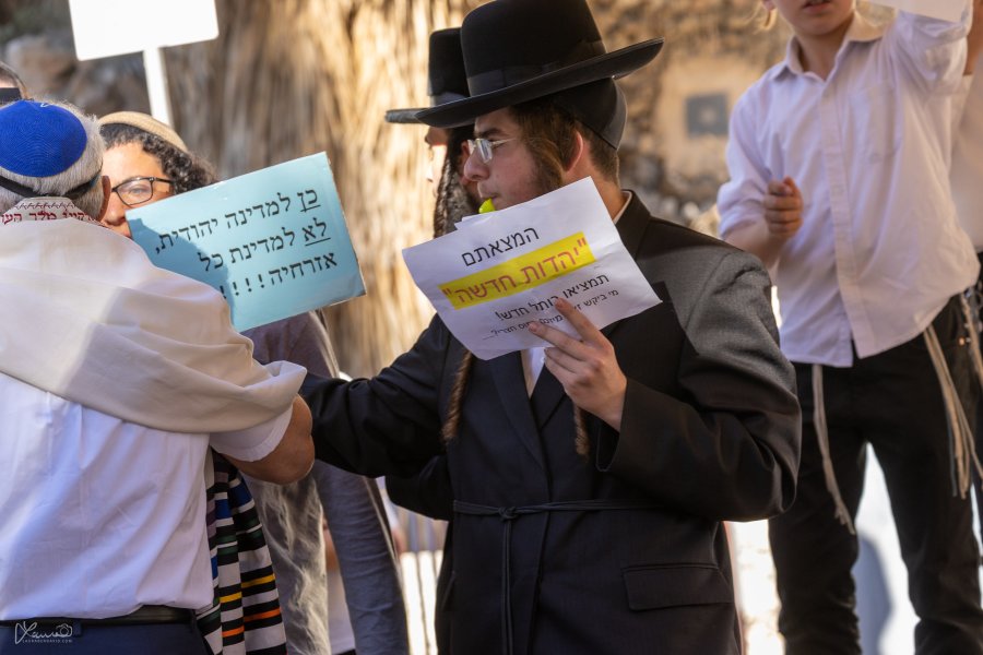Young ultra-Orthodox men disrupt a bar mitzvah celebration at the egalitarian section of the Western Wall in Jerusalem's Old City (Photo: Laura Ben-David/Twitter)