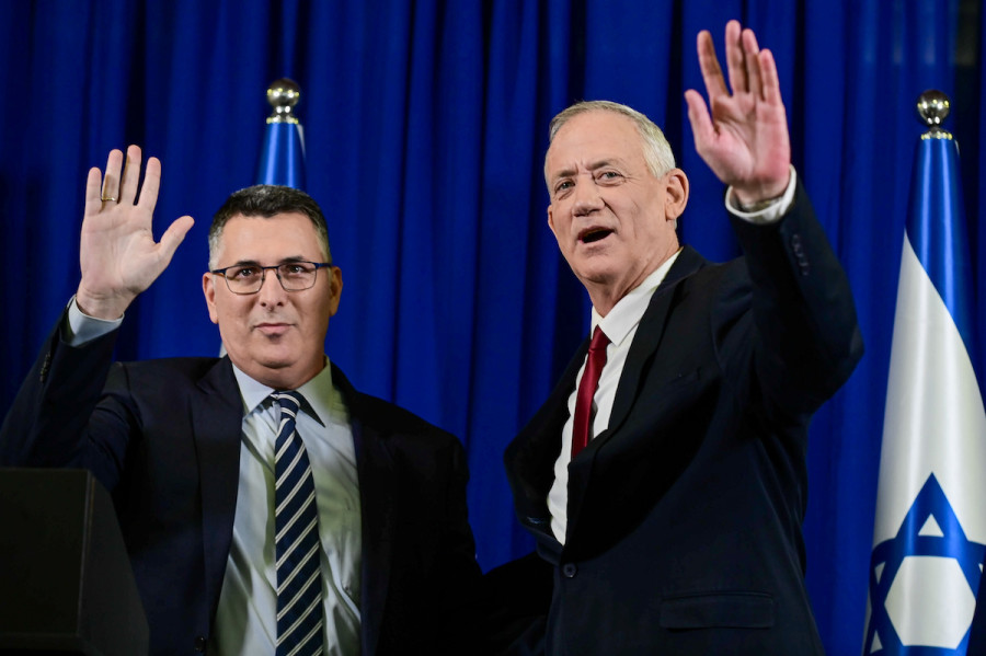 Justice Minister Gideon Sa'ar and Defense Minister Benny Gantz hold a press conference announcing the merger of their parties ahead of the upcoming election, in Ramat Gan, July 10, 2022. (Photo: Tomer Neuberg/Flash90)