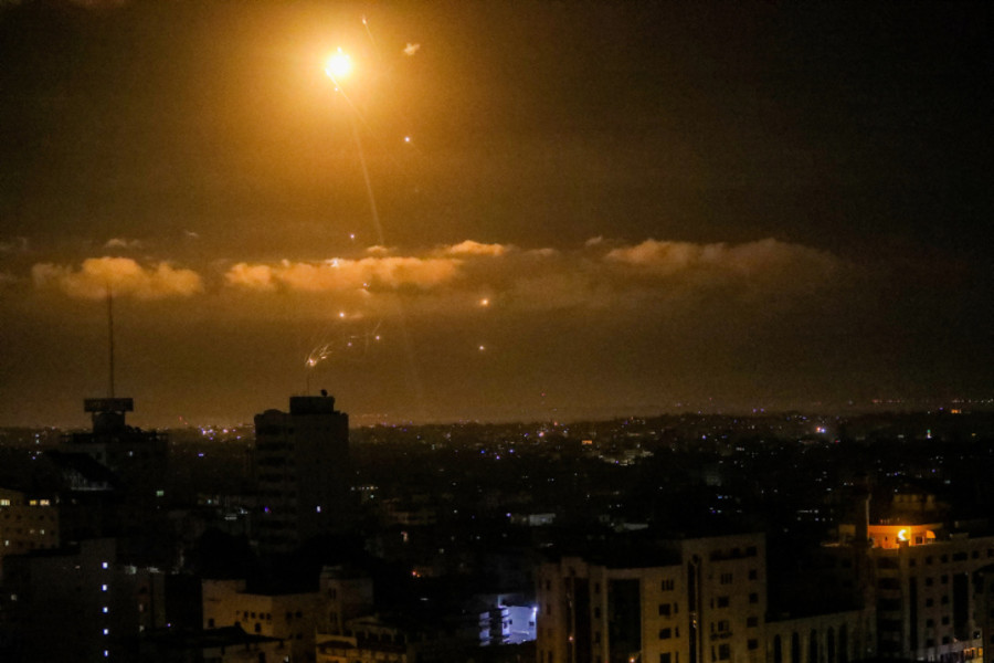 Illustrative - An Iron Dome air defense system launches missiles to intercept rockets fired from the Gaza Strip toward Israel as it seen from Gaza City, April 21, 2022. (Photo: Attia Muhammed/Flash90)