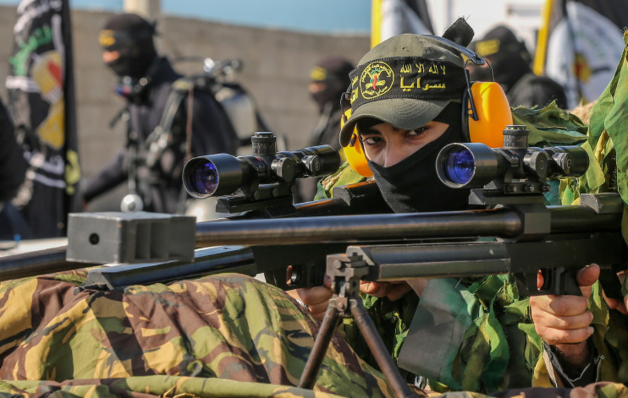 Members of the Saraya al-Quds Brigades, the armed wing of the Palestinian Islamic Jihad movement, take part in a military parade in Al-Shati refugee camp, west of Gaza City, June 24, 2022. (Photo: Attia Muhammed/Flash90)