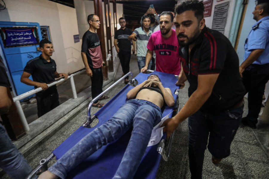 Palestinian medics transport injured Palestinians, in Rafah, in the southern Gaza Strip, on August 6, 2022. (Photo: Abed Rahim Khatib/Flash90)