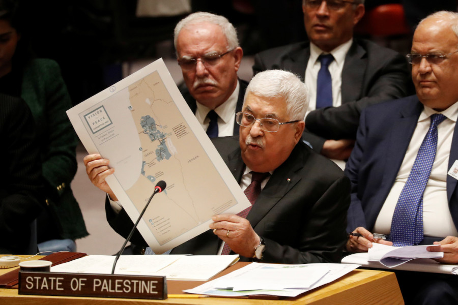 Palestinian Authority President Mahmoud Abbas holds a map while speaking during a Security Council meeting at the United Nations in New York, Feb. 11, 2020. (Photo: REUTERS/Shannon Stapleton)