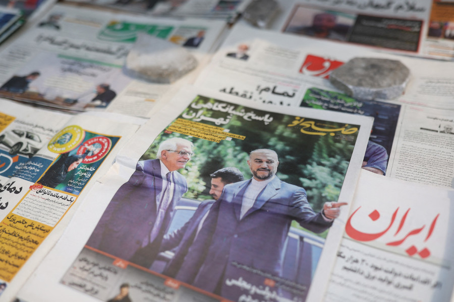 A newspaper with a cover picture of the Iranian Foreign Minister Hossein Amir-Abdollahian and High Representative of the European Union for Foreign Affairs and Security Policy Josep Borrell, is seen in Tehran, Iran, Aug. 16, 2022. (Photo: Majid Asgaripour/WANA via REUTERS)