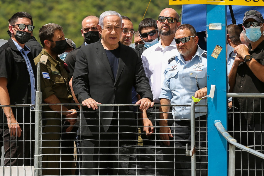 Then-Prime Minister Benjamin Netanyahu visits the scene of the disaster on Mt. Meron, April 30, 2021. (Photo: David Cohen/Flash90)