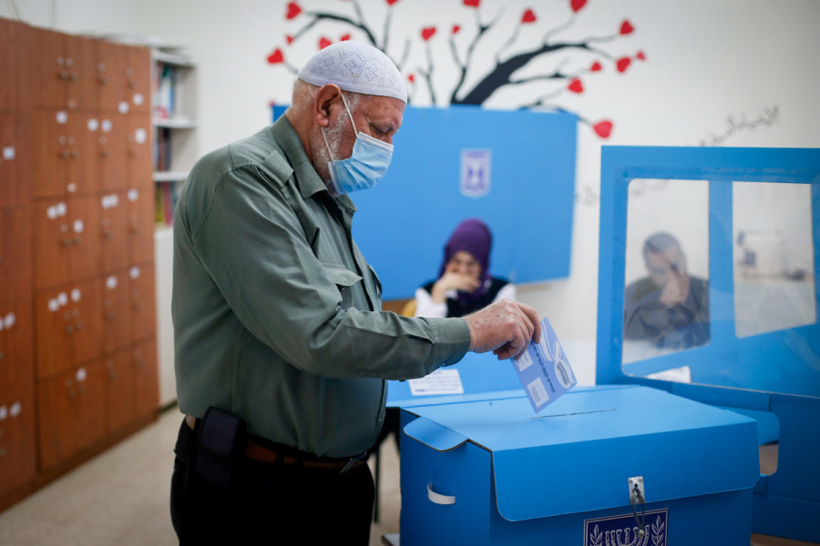 Arab-Israelis cast their ballots in Israel's general election, in Kafr Manda, northern Israel on March 23, 2021. (Photo: Jamal Awad/Flash90)