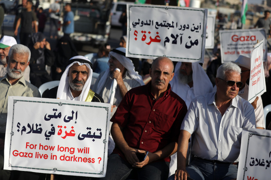 Palestinians participate in a rally at the Gaza City sea port, in which they demand their right to receive gas from maritime fields in the eastern Mediterranean and the lifting of the blockade, Sept. 13 2022. (Photo: Majdi Fathi/NurPhoto via Reuters)