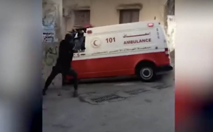 Palestinian militants take cover behind an ambulance in a shootout with IDF forces (Photo: Screenshot)