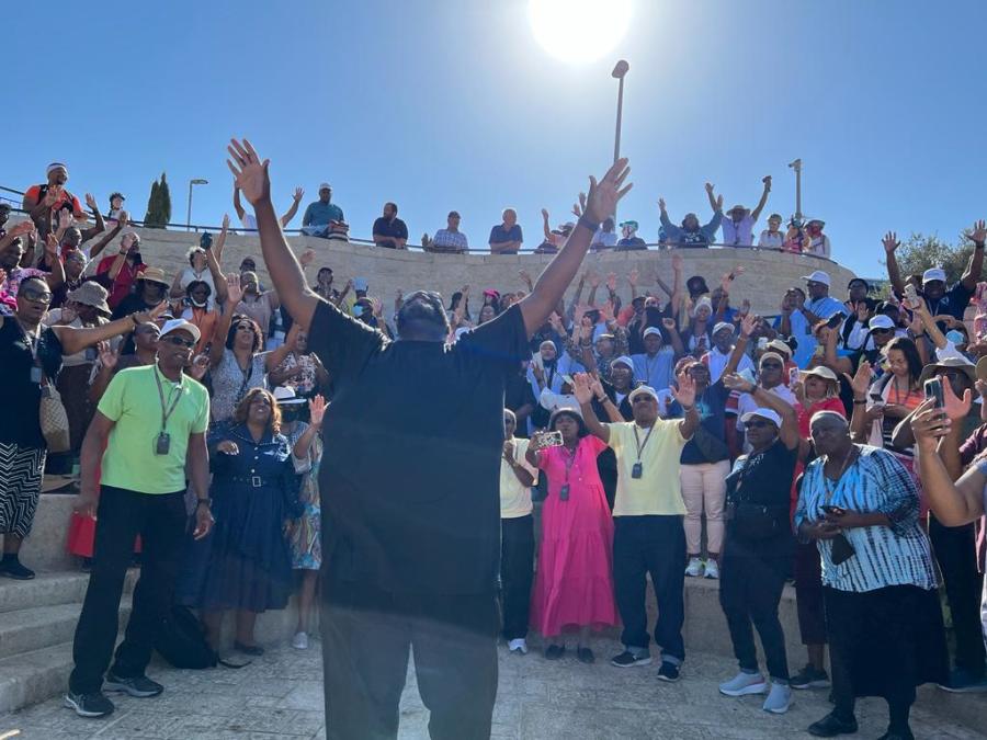 COGIC minister Elder Derrick Starks leading in worship on Mt. of Olives, September 2022 (Photo courtesy)