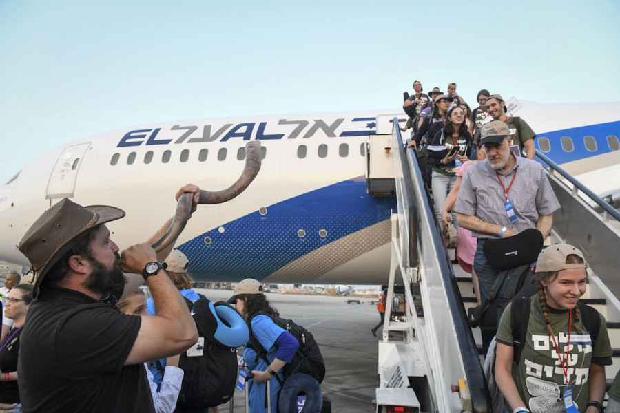 Illustrative - New immigrants from North America arrive on a special "Aliyah Flight" on behalf of Nefesh B'Nefesh organization, at Ben Gurion International Airport, Aug. 14, 2019. (Photo: Flash90)
