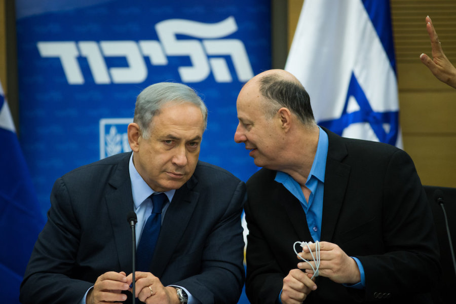 Israeli Prime Minister Benjamin Netanyahu speaks with MK Tzachi Hanegbi during a Likud party meeting in the Knesset, Feb. 8, 2016. (Photo: Yonatan Sindel/Flash90)
