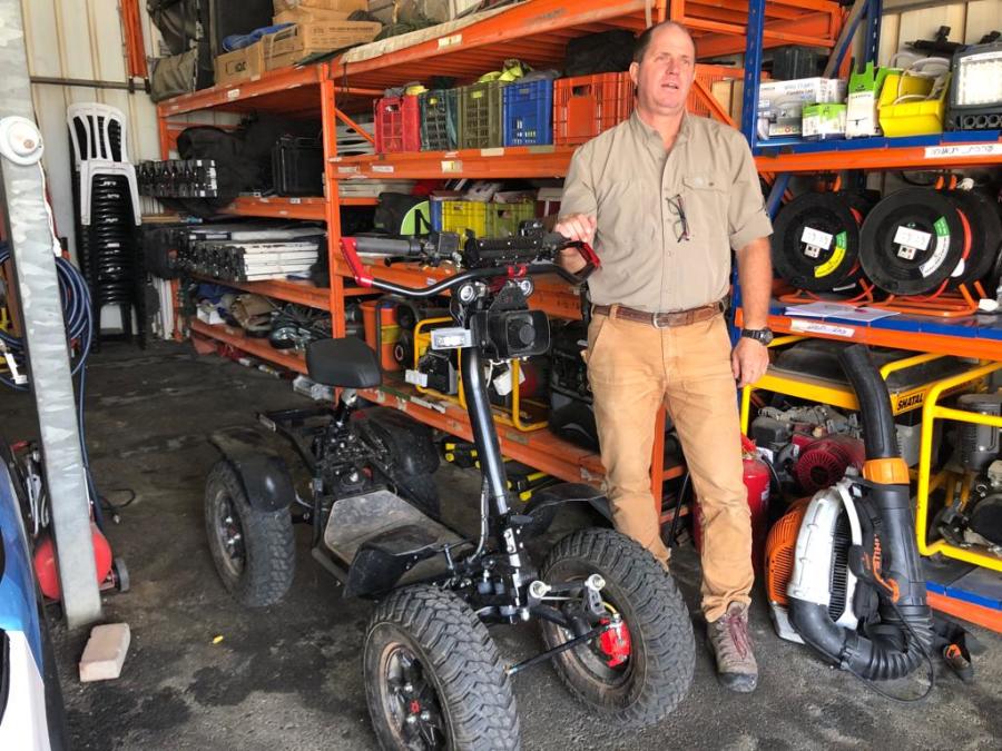Yaakov Dolev and specially designed ATV donated by Israel Magen Fund. (Photo: All Israel News)