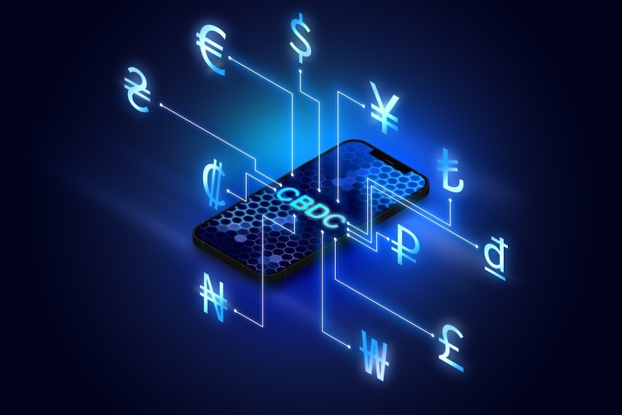 Central Bank Digital Currency banner and a smartphone with symbols of fiat currencies of different countries, cryptocurrency and smart money concept (Photo: Shutterstock)