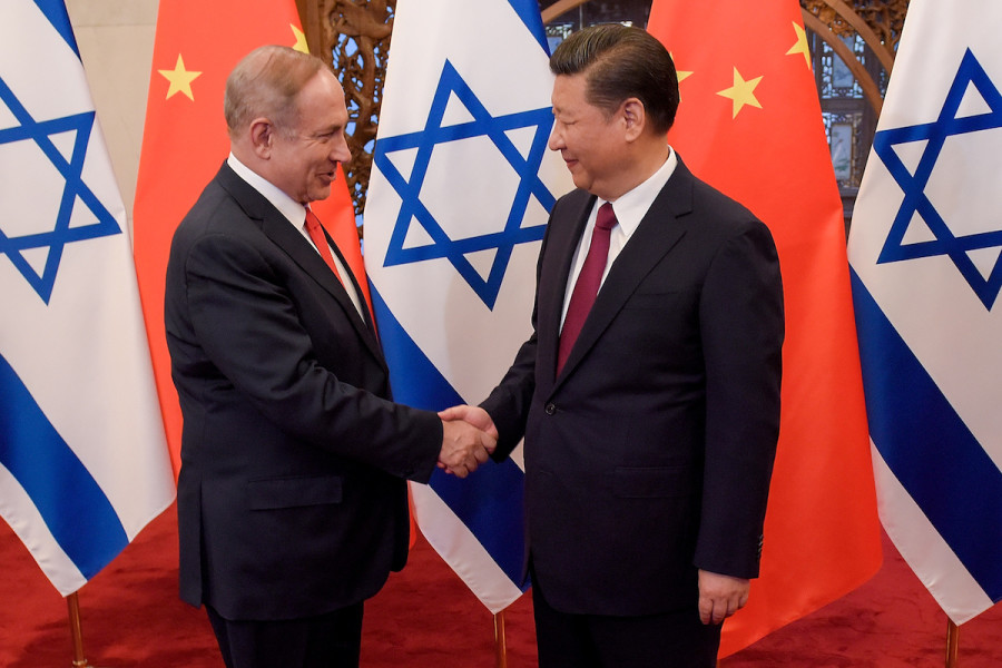 Chinese President Xi Jinping and then-Israeli Prime Minister Benjamin Netanyahu shake hands ahead of their talks at Diaoyutai State Guesthouse in Beijing, China, March 21, 2017. (Photo: REUTERS/Etienne Oliveau/Pool)