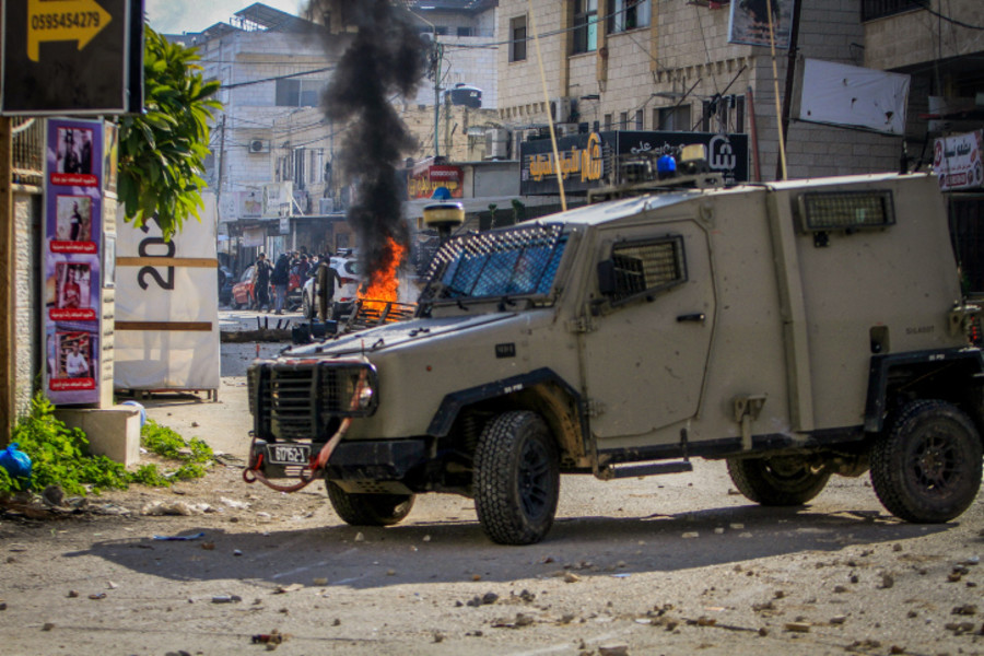 Palestinians clash with Israeli security forces during a raid in the West Bank city of Jenin on Jan. 26, 2023. Photo by Nasser Ishtayeh/Flash90